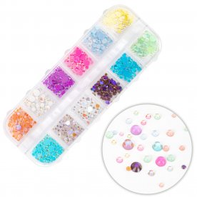 Kasetka z ozdobami kamyki...